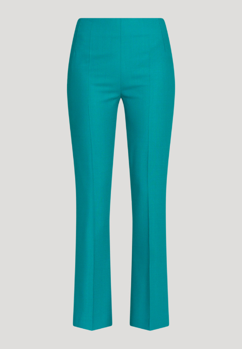 Tailored fit and flair wool trousers by Maire Forkin